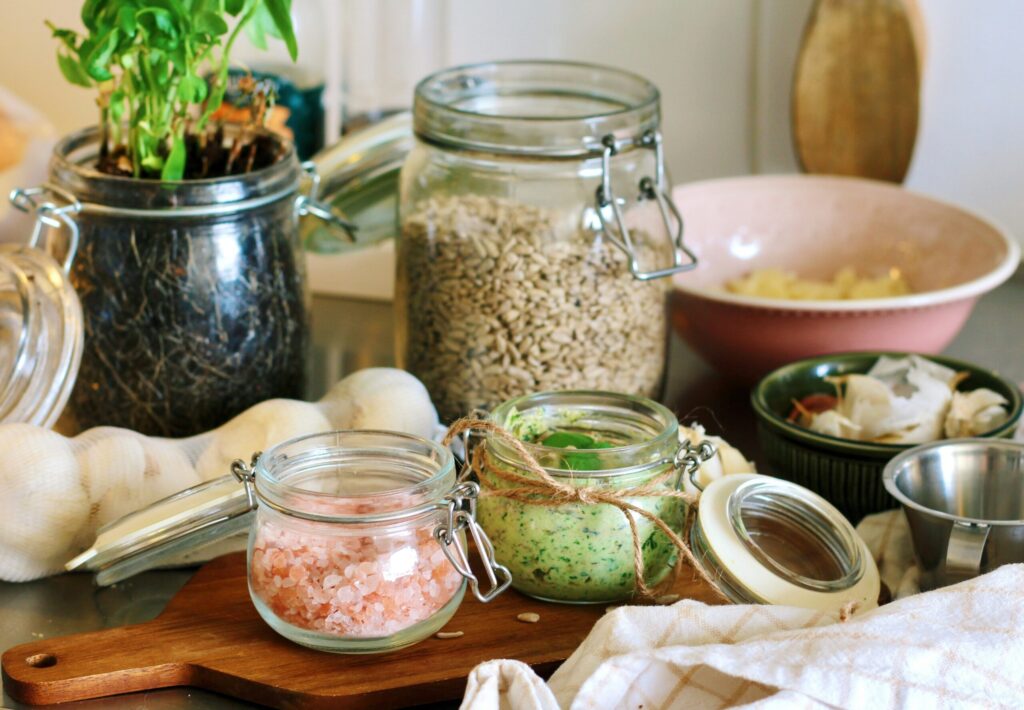 Zero-waste kitchen setup with glass jars of bulk foods