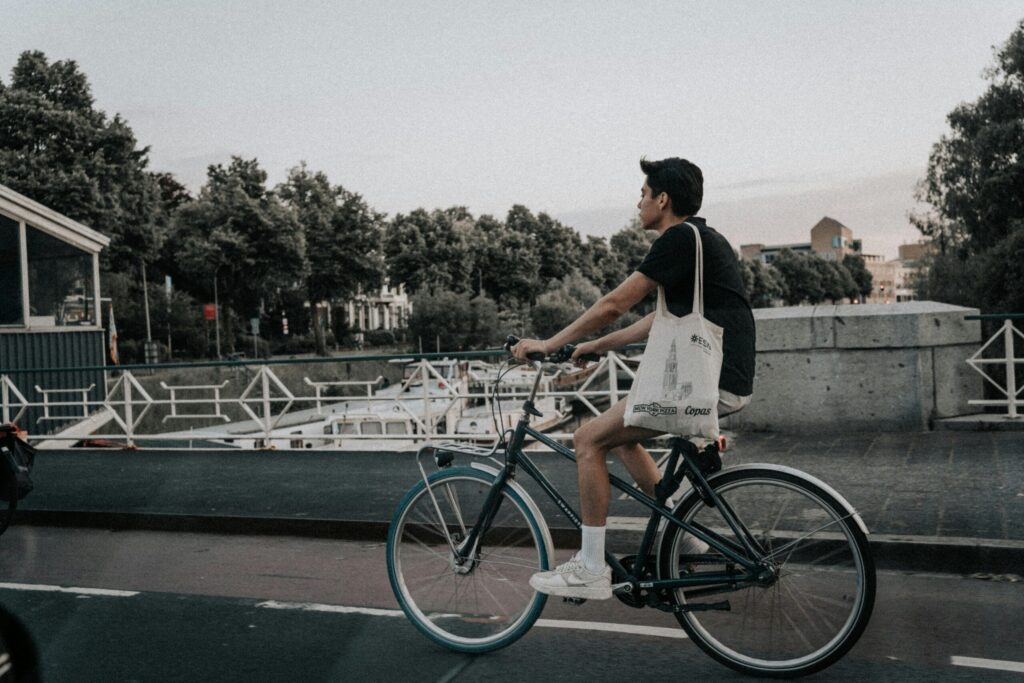 Cyclist riding in a city bike lane
