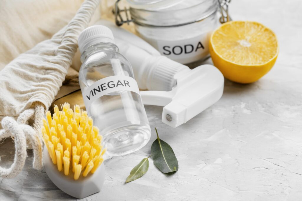 natural cleaning ingredients: vinegar, baking soda, lemon